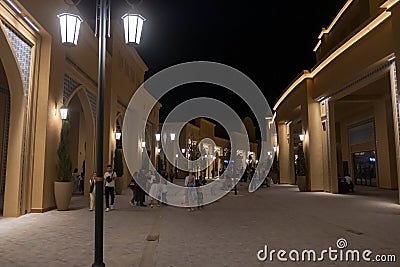 Beautiful illumination on the night street of Karavan Saray complex Editorial Stock Photo