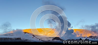 Beautiful image of people observing geysers throwing steam. Taken at the sunrise in Geysers of Tatio at Los Flamencos national Stock Photo