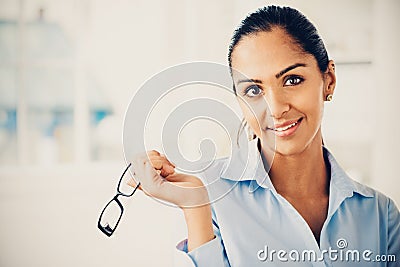 Beautiful Indian business woman portrait smiling happy Stock Photo