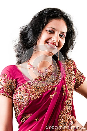 Beautiful Indian happy woman in pink sari Stock Photo