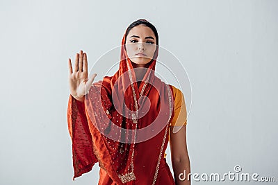 Beautiful indian woman in sari showing Stock Photo