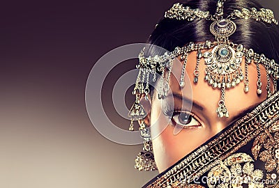 Beautiful Indian women portrait with jewelry. Stock Photo