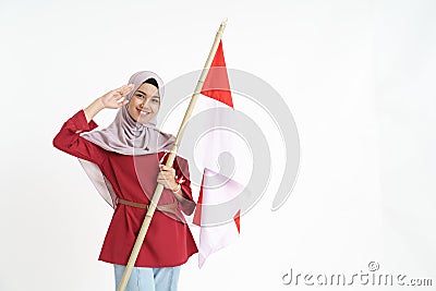 Beautiful indonesian woman salute gesture Stock Photo