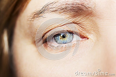 A beautiful insightful look woman`s eye. Close up shot Stock Photo