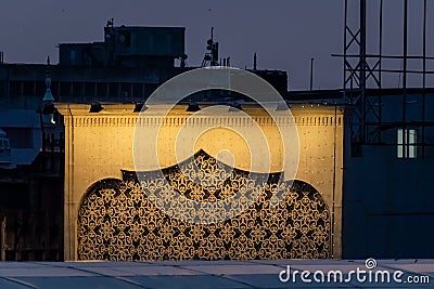 Beautiful intricate lattice design carvings on a wall on a rooftop of a building in the old Editorial Stock Photo