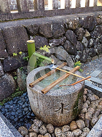 Beautiful japanese fountain with water Stock Photo