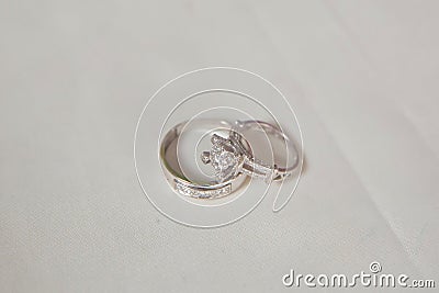 Cluster stack of diamond wedding engagement rings isolated on white . Beautiful jewelry rings Stock Photo
