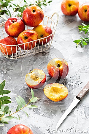 Beautiful juicy nectarines. Ripe farm harvest. Fragrant fruits. Fresh Juicy Organic Nectarines Stock Photo