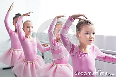 beautiful kids in pink tutu skirts dancing Stock Photo