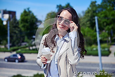 Beautiful lade smiling and drinking coffee Stock Photo