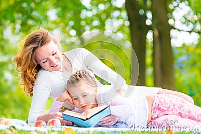 Beautiful ladies on a sunny day in the park Stock Photo