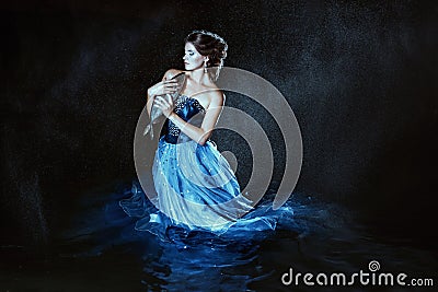 Beautiful lady in blue dress Stock Photo
