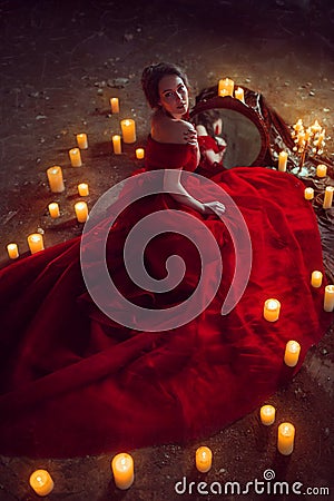 Beautiful lady with candles Stock Photo