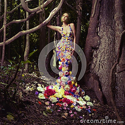 Beautiful lady in dress of flowers Stock Photo