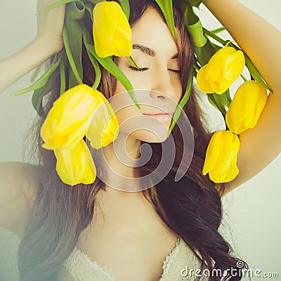 Beautiful lady with tulip Stock Photo