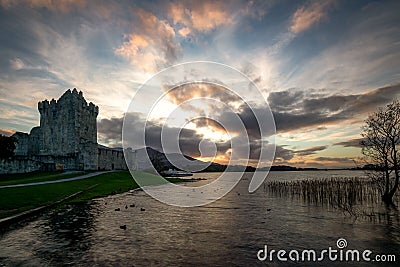 Beautiful lake in front of the old Roscommon Castle in Ireland under a cloudy sky Stock Photo
