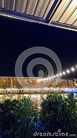 Beautiful lake at night filled with lights Stock Photo