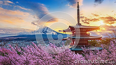 Beautiful landmark of Fuji mountain and Chureito Pagoda with cherry blossoms at sunset, Japan. Spring in Japan Stock Photo