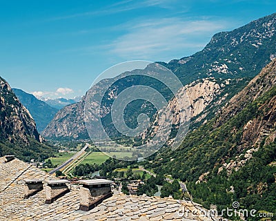 Beautiful landscape in the Aosta Valley mountainous region in northwestern Italy. Alpine valley in summer seen from fort Bard. Stock Photo