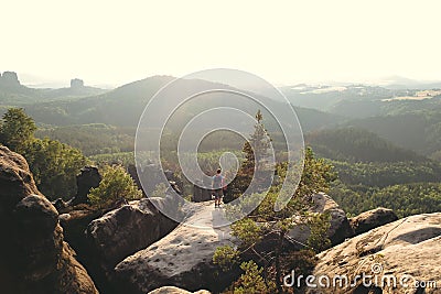 Beautiful landscape at elbsandsteingebirge with a couple enjoying the landscape Stock Photo