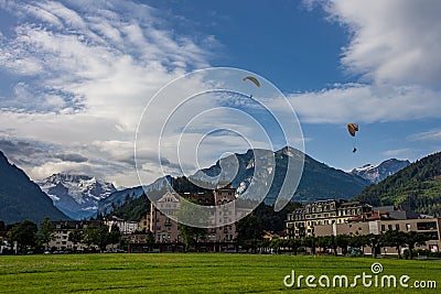 Beautiful landscape of Interlaken downtown with jungfrau peak behide, Switzerland Editorial Stock Photo