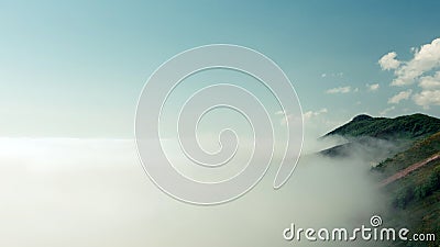 Beautiful landscape nature in morning on peak mountain with sunlight cloud fog and bright blue sky Stock Photo