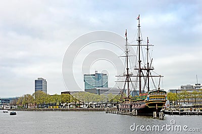 Beautiful landscape with old sailing ship on the channel Amsterdam Stock Photo