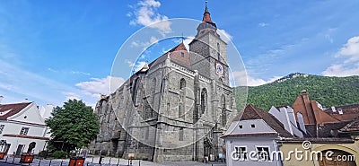 `Biserica Neagra` Church and `Timpa` mountain from Brasov, Romania Stock Photo