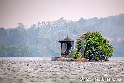 Small sanctuary in the middle of river in Sri Lanka Stock Photo