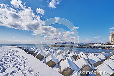 Beautiful landscape scenic of Hakodate mountain at the end of Matsukura river to ocean in Hakodate city Stock Photo