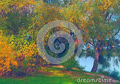 Beautiful landscape showing autumn forest beside river shore Stock Photo