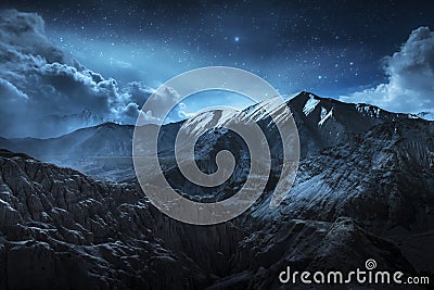 Beautiful landscape snow mountains at night on blue cloud and star background. Leh, Ladakh, IndiaDouble Exposure Stock Photo