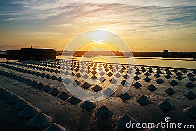 Beautiful landscape at sunset salt Farming. sea-salt production in the country, Stock Photo