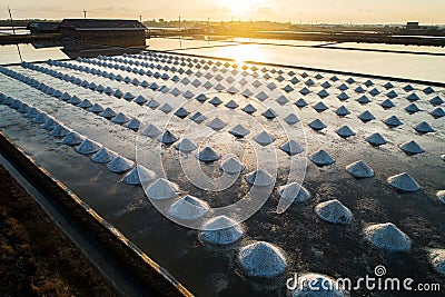 Beautiful landscape at sunset salt Farming. sea-salt production in the country. Stock Photo