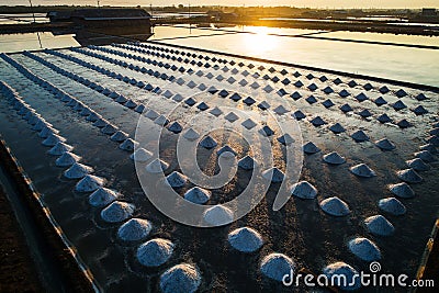 Beautiful landscape at sunset salt Farming. sea-salt production in the country, Stock Photo