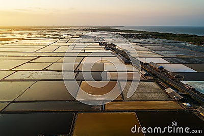 Beautiful landscape at sunset salt Farming. sea-salt production in the country, Sunset in Salt farming at Samut Sakhon Thailand. Stock Photo