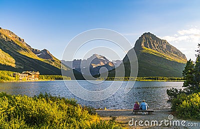 Beautiful landscape at Swiftcurrent Lake when sunrise in Many Glacier area ,Montana`s Glacier National Park,Montana,usa Editorial Stock Photo