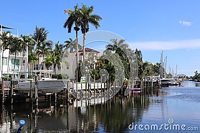 Beautiful landscape view of a canal waterway with luxury homes and boat docks in Fort Lauderdale Editorial Stock Photo