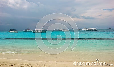 Beautiful landscape view of Maldives clear white sandy beach Island Stock Photo