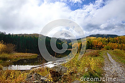 Beautiful landscape of the Wood's Lake Telluride, Colorado with golden fall aspens and pines Stock Photo