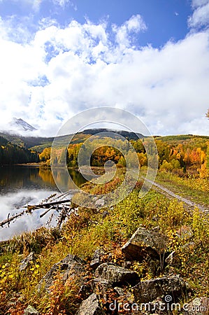 Beautiful landscape of the Wood's Lake Telluride, Colorado with golden fall aspens and pines Stock Photo