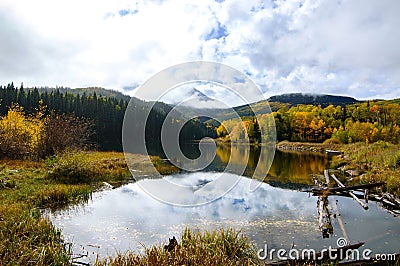 Beautiful landscape of the Wood's Lake Telluride, Colorado with golden fall aspens and pines Stock Photo