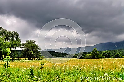 Beautiful lansdcape with blue cloudy sky in Caucasus mountains Stock Photo