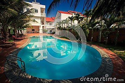 Beautiful Large Oval Pool among Palm Trees Editorial Stock Photo
