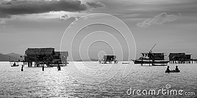 Beautiful daily life view of Bajau Laut People with their floating house on the sea in Semporna Sabah, Malaysia Stock Photo