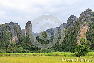 Beautiful limestome mountain range at Ban Mung Village, Noen Maprang District, Phitsanulok, Thailand Stock Photo