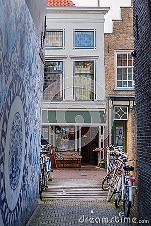 Beautiful little alley in city center of Delft, Netherlands Editorial Stock Photo