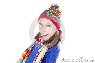 Beautiful little girl in cap and scarf Stock Photo