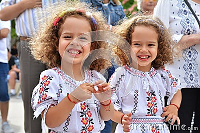 Beautiful little girls at `Ziua Iei ` - International Day of the Romanian Blouse Editorial Stock Photo