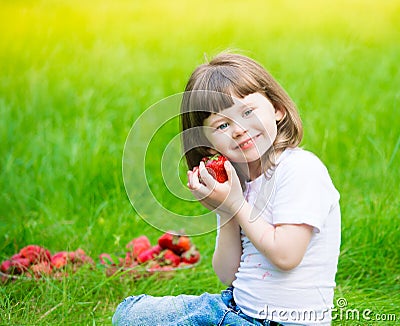 Girl face, strawberry, fun, close up Stock Photo